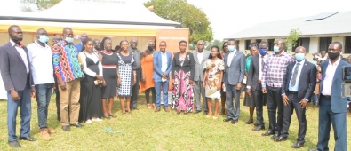 state minister for education Rosemary Ssenindde poses for a group photo during the launch of digital learning in Isenda primary school -Kigandalo sub county.