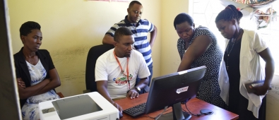 Officers undergoing computer training.