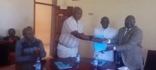 Outgoing District Chairperson (right) handing over office to CAO