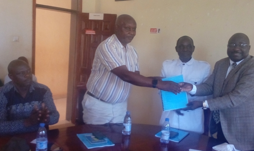 Outgoing District Chairperson (right) handing over office to CAO